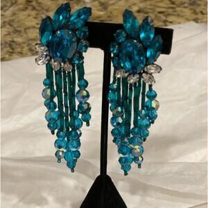 Earrings - Nightingale vintage- clip stunning  on. Does not show sparkle. 4 1/2”